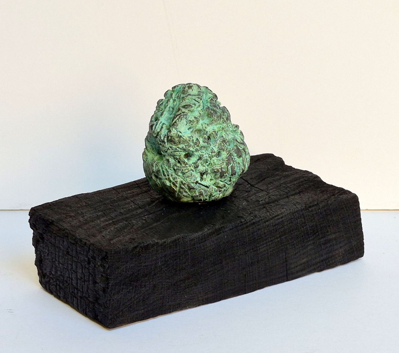 Bud, 2026, bronze, burnt oak, h 13x19.5x10.5 cm, 1/1